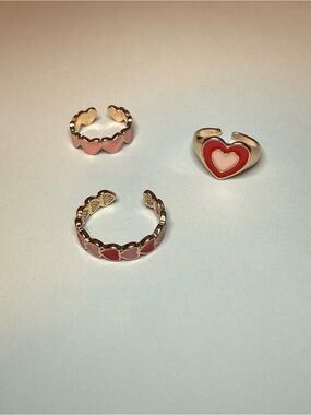 Cute pink and red gold tone adjustable rings with heart designs - Set of 3